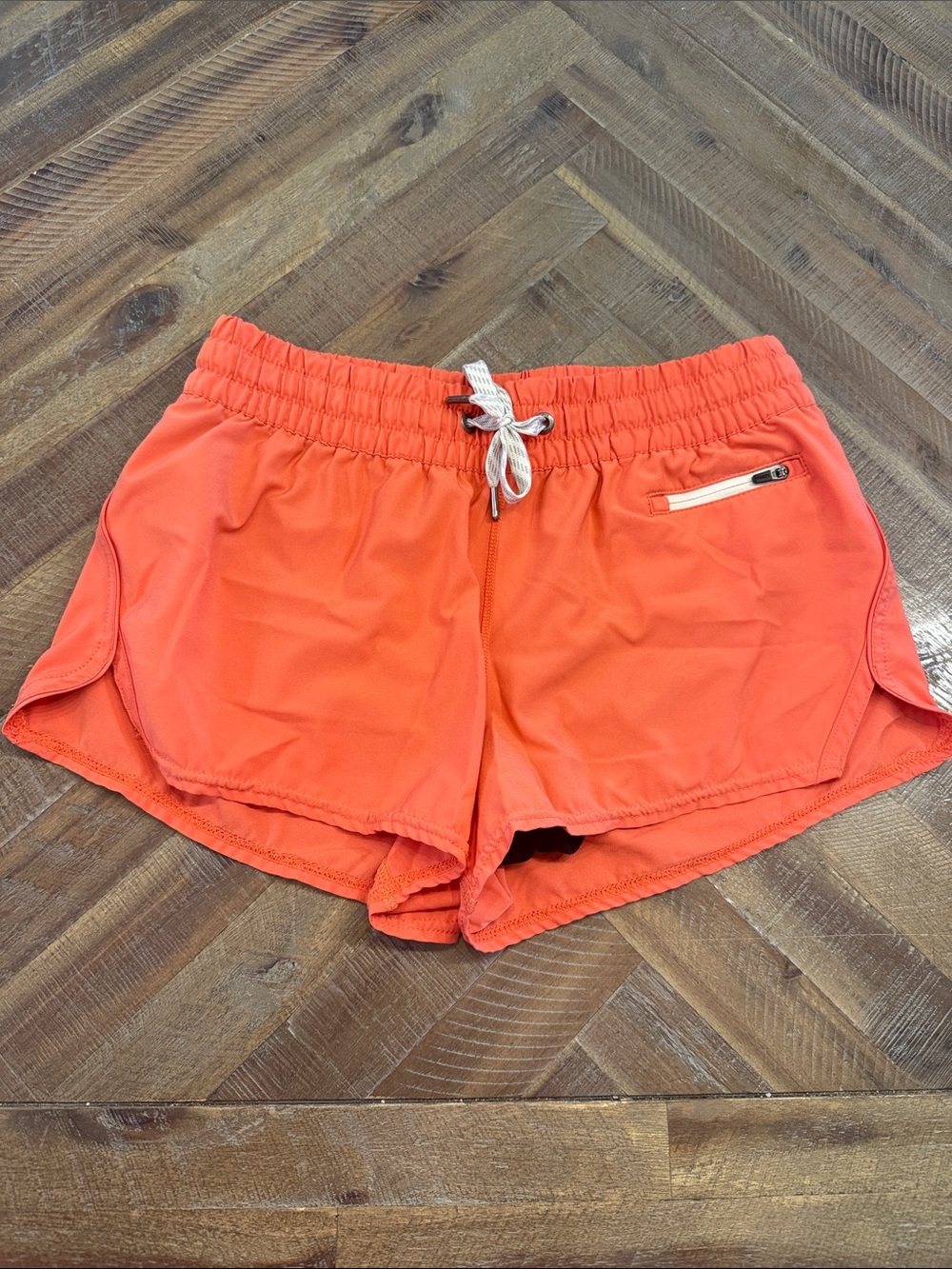 Vuori Women’s Active Drawstring Shorts in Coral Orange